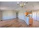 Open-concept living space with hardwood floors, recessed lighting, and a view of the kitchen at 4524 E Walkerton Rd., Myrtle Beach, SC 29579