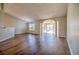 Bright living room featuring hardwood floors, neutral paint, chandelier and lots of natural light at 4524 E Walkerton Rd., Myrtle Beach, SC 29579