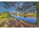 Picturesque backyard view featuring a serene waterway and well-maintained landscaping at 4524 E Walkerton Rd., Myrtle Beach, SC 29579