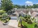 Beautiful aerial view of the home showcasing its lush landscaping, driveway, and surrounding neighborhood at 4703 Bermuda Way, Myrtle Beach, SC 29577