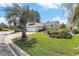 Attractive home with a well-manicured lawn and beautiful landscaping at 4703 Bermuda Way, Myrtle Beach, SC 29577
