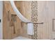 Shower with tiled walls, grab bars, and a white shower curtain at 4800 S Ocean Blvd. # 1008, North Myrtle Beach, SC 29582