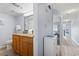 Bathroom featuring a double sink vanity, granite countertop, and a toilet at 4800 S Ocean Blvd. # 1008, North Myrtle Beach, SC 29582