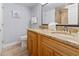 Well-appointed bathroom featuring double sinks with granite countertops at 4800 S Ocean Blvd. # 1008, North Myrtle Beach, SC 29582