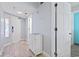 Entryway features tiled floors, a small cabinet, and an entry door at 4800 S Ocean Blvd. # 1008, North Myrtle Beach, SC 29582
