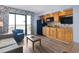Inviting living room featuring a kitchenette and balcony offering nice views at 4800 S Ocean Blvd. # 1008, North Myrtle Beach, SC 29582