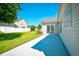 Well-maintained backyard, featuring a concrete patio and a lush green lawn at 501 Painted Duck Ct., Myrtle Beach, SC 29588