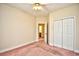A standard bedroom offers a ceiling fan and a door to a bathroom and a closet at 501 Painted Duck Ct., Myrtle Beach, SC 29588