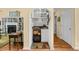 Charming bar area with custom shelving, wine glass racks, and a beverage station at 509 June Bug Ct., Myrtle Beach, SC 29588
