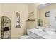 Well-lit powder room featuring sleek fixtures, neutral colors, and decor accents at 509 June Bug Ct., Myrtle Beach, SC 29588