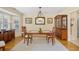 Formal dining room features hardwood floors, and classic decor with natural light at 509 June Bug Ct., Myrtle Beach, SC 29588