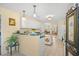 Bright kitchen featuring white cabinets, green countertops, and a decorative island at 509 June Bug Ct., Myrtle Beach, SC 29588
