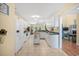 Expansive kitchen with white cabinets, green countertops, an island, and modern appliances at 509 June Bug Ct., Myrtle Beach, SC 29588