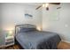 Bedroom featuring ceiling fan, side tables with lamps and nautical décor at 510 Fairwood Lakes Dr. # R-17, Myrtle Beach, SC 29588
