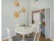 Charming dining area with an in-unit laundry and hot water tank, perfect for space-saving convenience at 510 Fairwood Lakes Dr. # R-17, Myrtle Beach, SC 29588