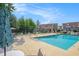 Exterior shot of the community pool area with lounge seating, tables, and bath house at 510 Fairwood Lakes Dr. # R-17, Myrtle Beach, SC 29588