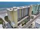 Aerial view of condo building near the beach and ocean at 5404 N Ocean Blvd. # 11-D, North Myrtle Beach, SC 29582