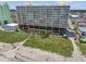Multi-story building with balconies and parking, with a boardwalk leading to the beach at 5404 N Ocean Blvd. # 11-D, North Myrtle Beach, SC 29582