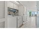 Convenient laundry room with full-size washer and dryer at 5404 N Ocean Blvd. # 11-D, North Myrtle Beach, SC 29582