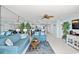 Spacious living room with cozy seating and an open layout connecting to the dining area and kitchen at 5404 N Ocean Blvd. # 11-D, North Myrtle Beach, SC 29582
