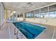 Indoor community pool with plenty of natural light and easy access at 5404 N Ocean Blvd. # 11-D, North Myrtle Beach, SC 29582