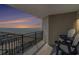 Balcony with ocean views, railing and outdoor seating at sunset at 5523 N Ocean Blvd. # 1505, Myrtle Beach, SC 29577