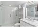 Modern bathroom featuring a walk-in shower with glass door and a marble vanity at 5523 N Ocean Blvd. # 1505, Myrtle Beach, SC 29577