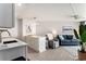 Modern kitchen featuring white cabinets, stainless steel appliances, and breakfast bar at 5523 N Ocean Blvd. # 1505, Myrtle Beach, SC 29577