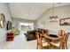 Bright living room with vaulted ceilings and sliding glass doors to balcony at 5801 Oyster Catcher Dr. # 832, North Myrtle Beach, SC 29582