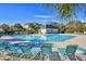 Inviting community pool with comfortable seating, shaded areas, and lush landscaping at 5801 Oyster Catcher Dr. # 832, North Myrtle Beach, SC 29582