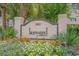 Landscaped entrance sign to Ironwood with colorful flowers and lush greenery at 5801 Oyster Catcher Dr. # 832, North Myrtle Beach, SC 29582