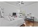 Bright bedroom with a serene atmosphere, featuring hardwood floors, modern decor, and lots of sunlight at 5904 Bridlewood Rd., North Myrtle Beach, SC 29582