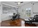 Home office with hardwood floors, large windows, and custom wall trim, perfect for working from home at 5904 Bridlewood Rd., North Myrtle Beach, SC 29582