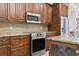 Updated kitchen featuring stainless steel appliances, granite countertops and custom cabinetry at 5904 Bridlewood Rd., North Myrtle Beach, SC 29582