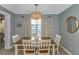Dining room with a view of the ocean, a hanging light fixture, and white walls at 5905 S Kings Hwy. # 416 A, Myrtle Beach, SC 29575