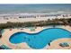 Aerial view of the large outdoor swimming pool with lounge chairs and easy beach access at 5905 S Kings Hwy. # 416 A, Myrtle Beach, SC 29575
