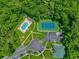 Aerial view of community with pool, tennis court, parking and landscaping at 650 Tupelo Ln. # 5-F, Longs, SC 29568