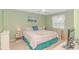 Comfortable bedroom with a queen-size bed, soft lighting, and a window view at 650 Tupelo Ln. # 5-F, Longs, SC 29568