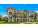 Elegant exterior of a multi-story condo building with balconies and meticulous landscaping at 650 Tupelo Ln. # 5-F, Longs, SC 29568