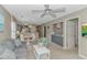 Inviting living room with comfortable sofa, dining area, and built-in cabinets with nautical decor at 650 Tupelo Ln. # 5-F, Longs, SC 29568
