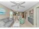 Spacious living room featuring an open floor plan, dining area, and built-in cabinets at 650 Tupelo Ln. # 5-F, Longs, SC 29568
