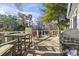 Relax on this spacious deck featuring outdoor seating and beautiful pond views at 6624 Lagoon Pl., Myrtle Beach, SC 29572