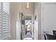 View of the house entrance with white wainscoting and natural light coming in from the front door at 6624 Lagoon Pl., Myrtle Beach, SC 29572