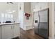 Kitchen featuring stainless steel appliances, wooden floors, and a breakfast nook at 6624 Lagoon Pl., Myrtle Beach, SC 29572