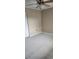 Bedroom featuring neutral carpet, a ceiling fan, and a door at 6702 Jefferson Jefferson Pl. # F2, Myrtle Beach, SC 29572