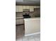 Functional kitchen featuring an island countertop and classic appliances at 6702 Jefferson Jefferson Pl. # F2, Myrtle Beach, SC 29572