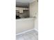 Neutral-toned kitchen featuring white countertops and tile flooring, bright with natural light at 6702 Jefferson Jefferson Pl. # F2, Myrtle Beach, SC 29572