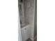 Compact bathroom sink with vanity and tiled walls, ideal for a small space at 6702 Jefferson Jefferson Pl. # F2, Myrtle Beach, SC 29572