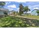 Expansive backyard featuring lush green grass, mature trees, and plenty of room for outdoor activities at 709 Triple Oak Ln., Garden City Beach, SC 29576