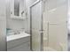 Bathroom featuring a vanity with a sink, a shower stall, and essential fixtures at 709 Triple Oak Ln., Garden City Beach, SC 29576